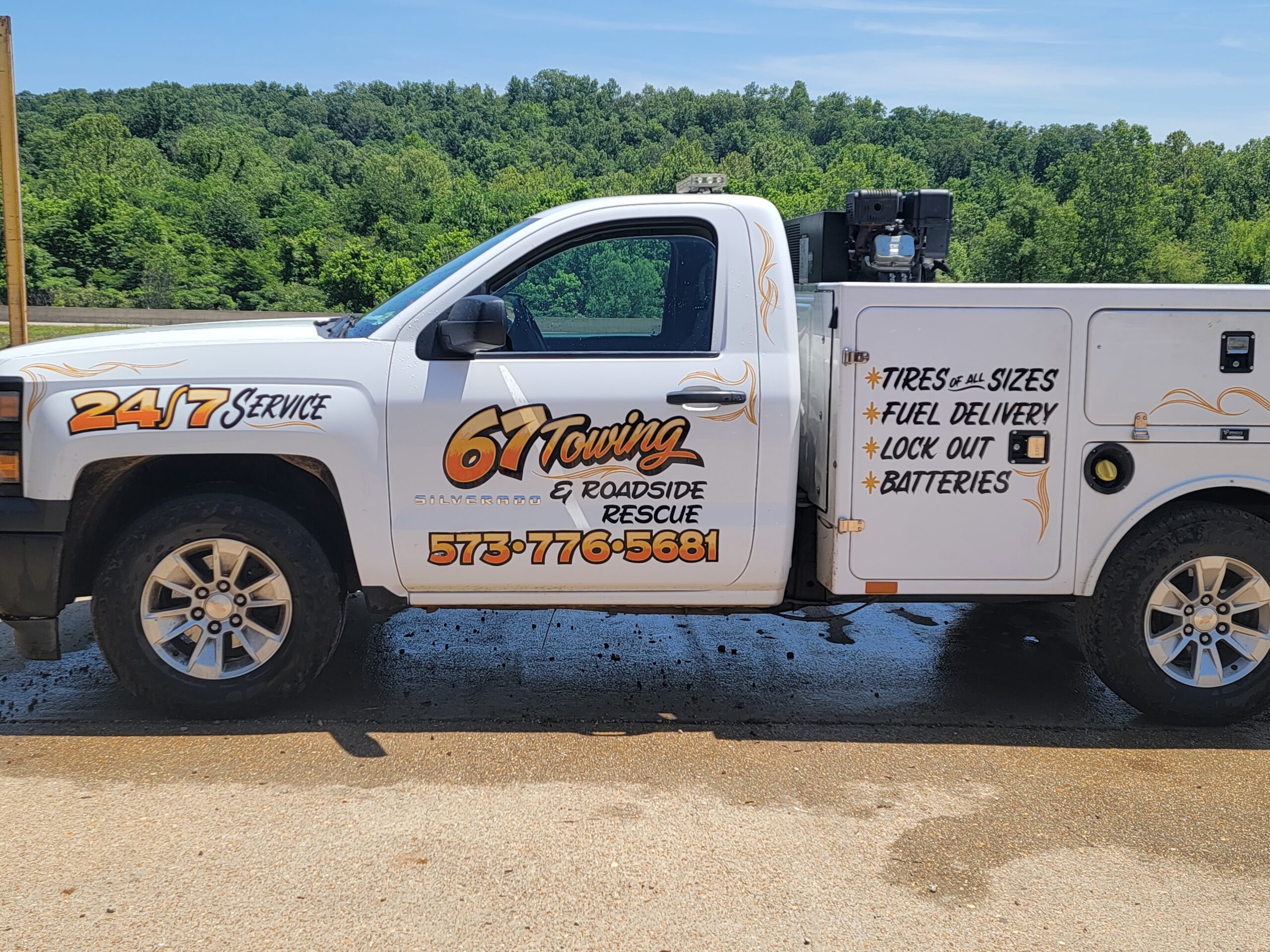 67 towing & roadside rescue truck